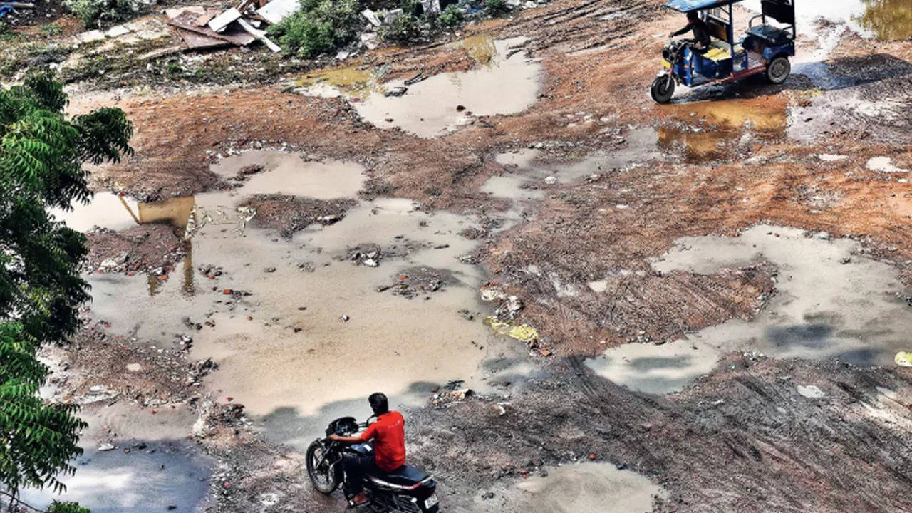 In pics: Delhi pothole menace continues to distress commuters